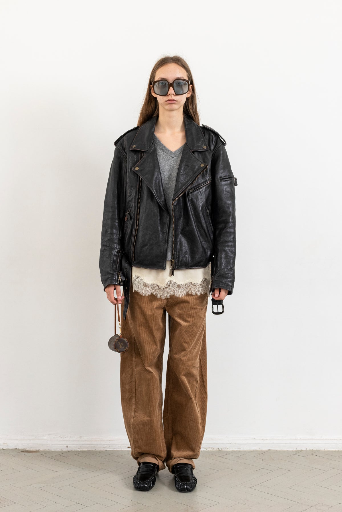 Vintage Black Leather Biker Jacket with Faded Seams