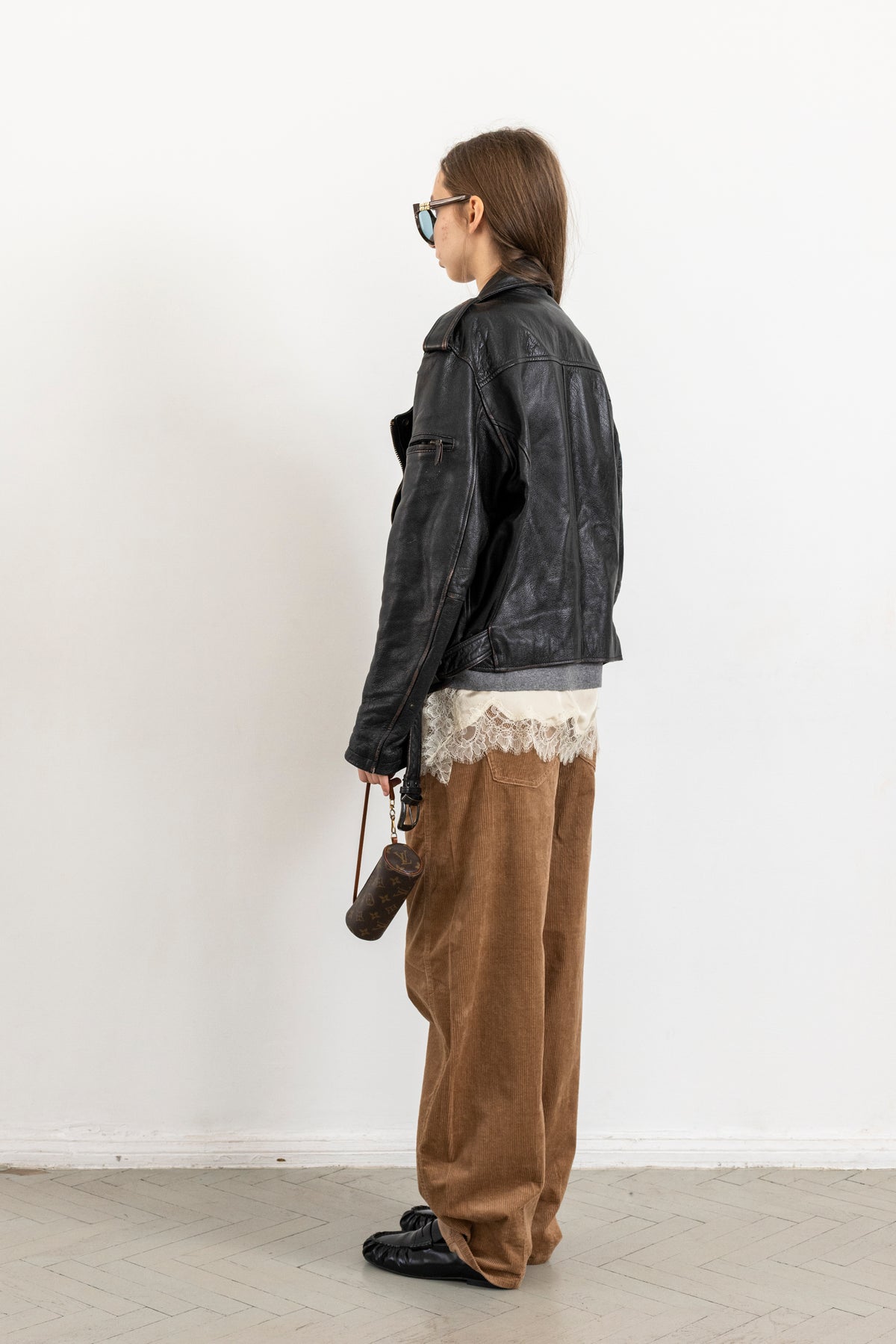 Vintage Black Leather Biker Jacket with Faded Seams