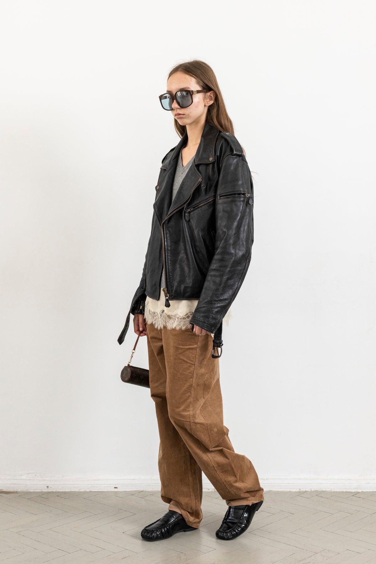 Vintage Black Leather Biker Jacket with Faded Seams
