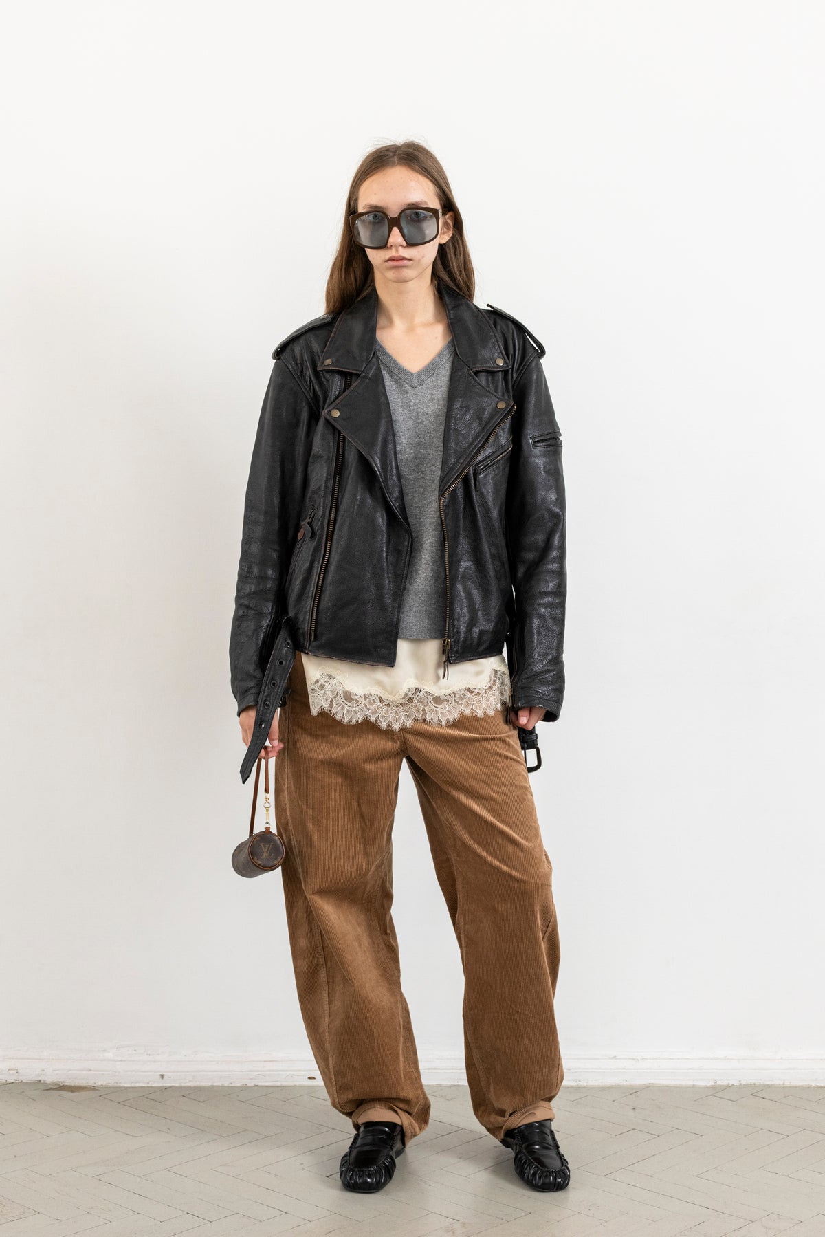 Vintage Black Leather Biker Jacket with Faded Seams