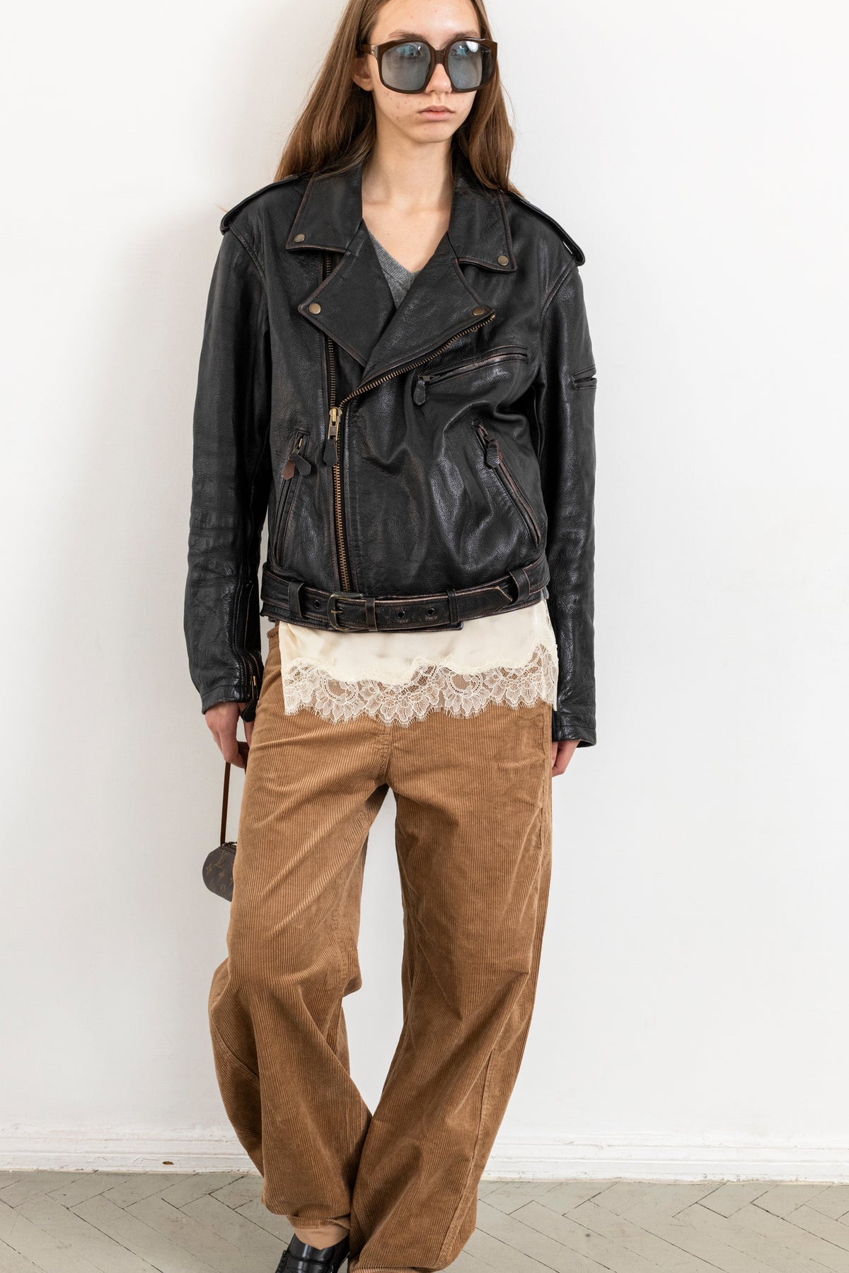 Vintage Black Leather Biker Jacket with Faded Seams