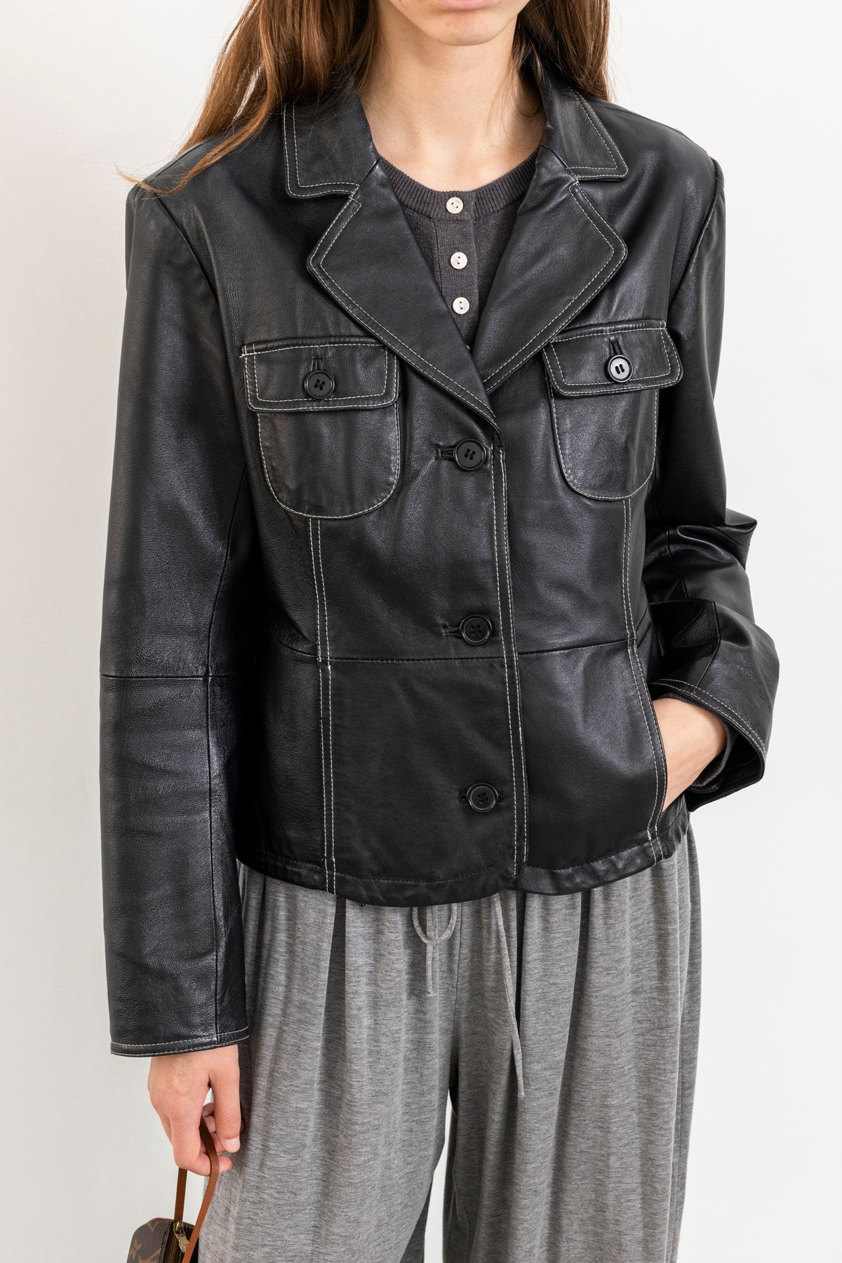Vintage Black Leather Jacket with Contrasting Stitching