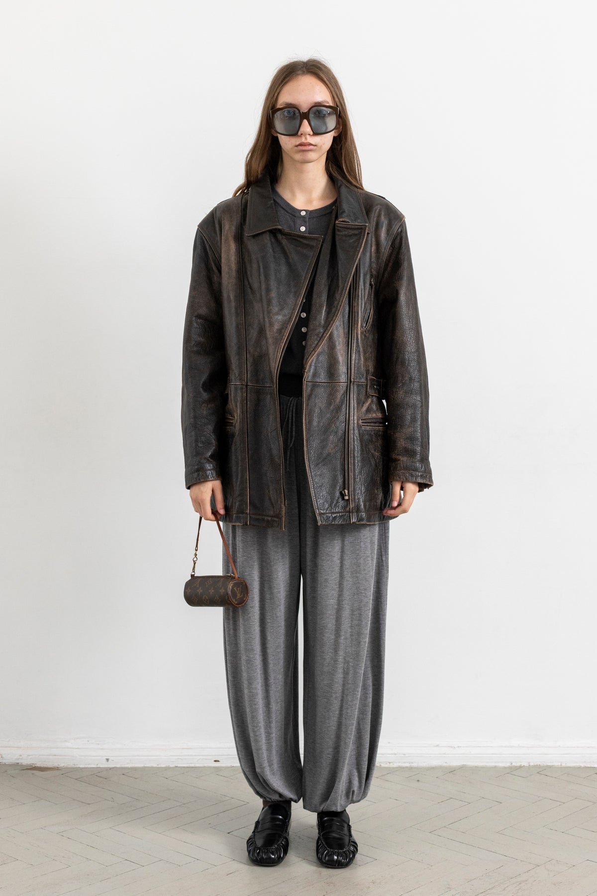 Vintage Brown Leather Biker Jacket with Buckled Waist