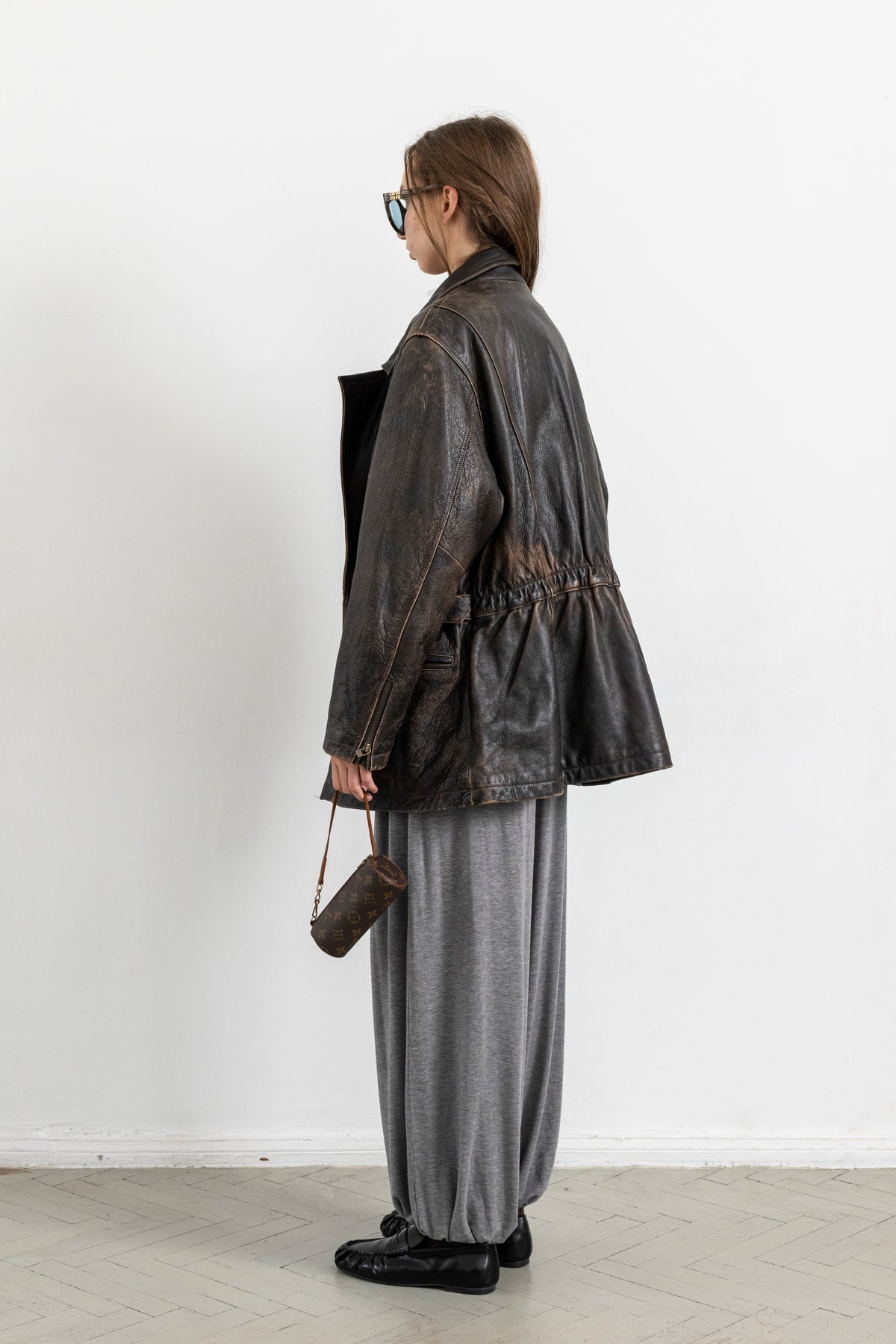 Vintage Brown Leather Biker Jacket with Buckled Waist