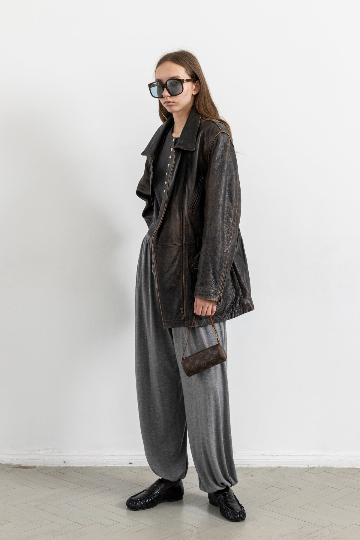Vintage Brown Leather Biker Jacket with Buckled Waist